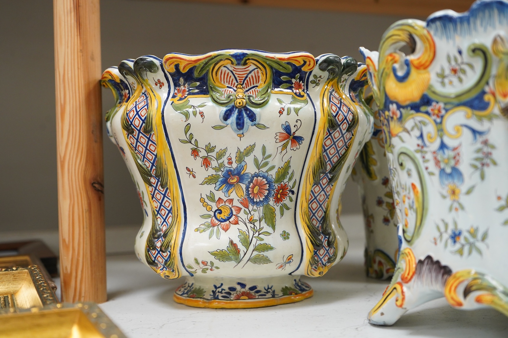 Four various late 19th century French faience planters and jardinières, largest 32cm in diameter